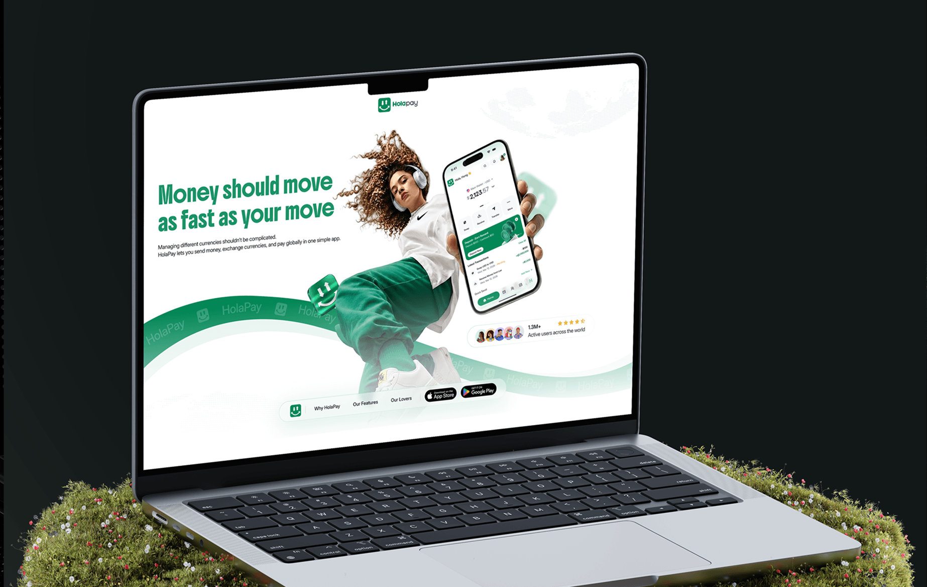 HolaPay landing page shown on a laptop resting on a floating island of moss